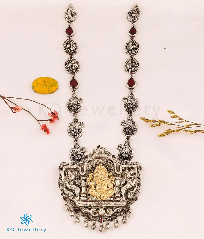 Handcrafted Crystal Necklace For Weddings-The Mahaganapati Silver Nakkasi Peacock & Kemp Necklace (Oval)