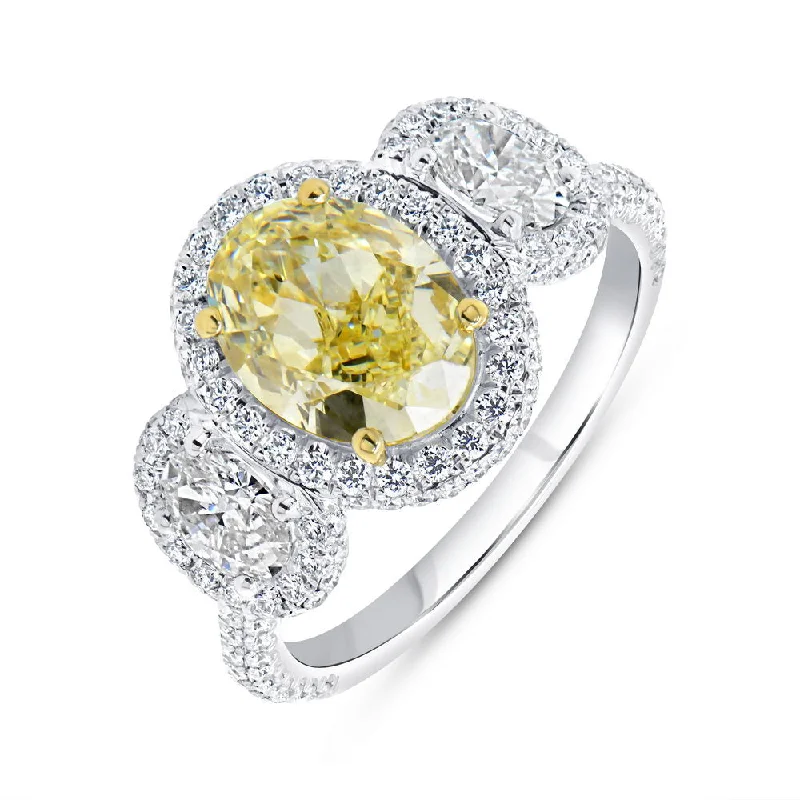 Trendy Wedding Bands For Fashion-Forward Couples-Uneek Natureal Collection 3-Stone-Halo Oval Shaped Fancy Light Yellow Diamond Engagement Ring