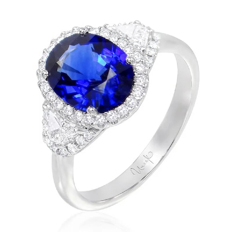 Sparkling Gemstone Wedding Rings For Brides-Uneek Three-Stone Oval Blue Sapphire and Trap Cut Diamond Halo Ring