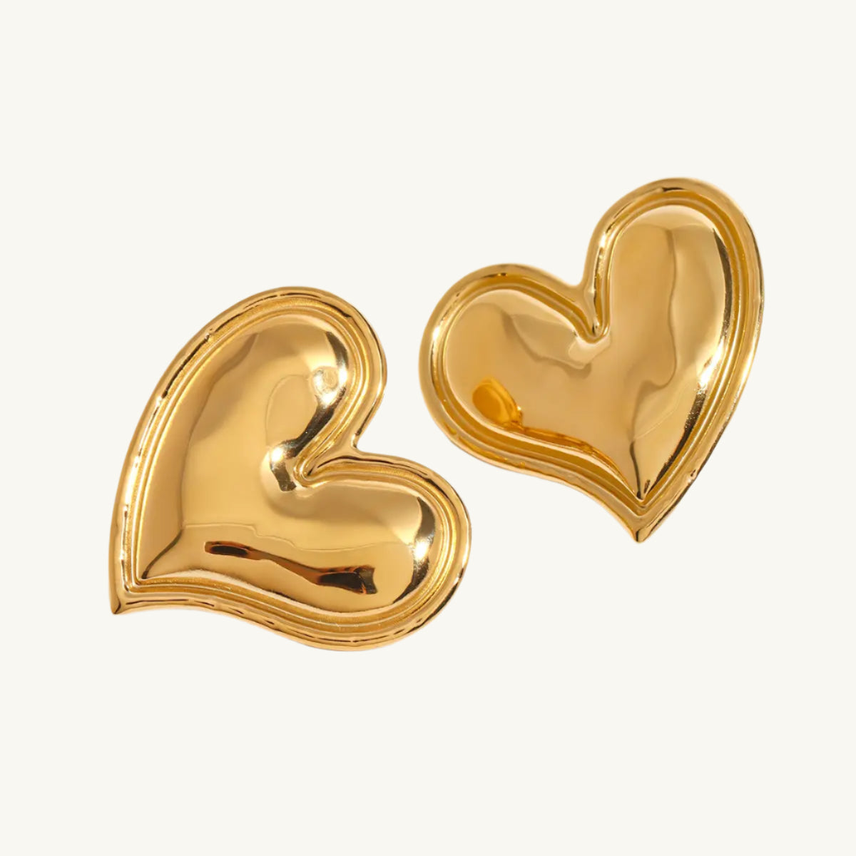 Trendy Silver Earrings For Casual Look-Gold Heart Stud Earrings